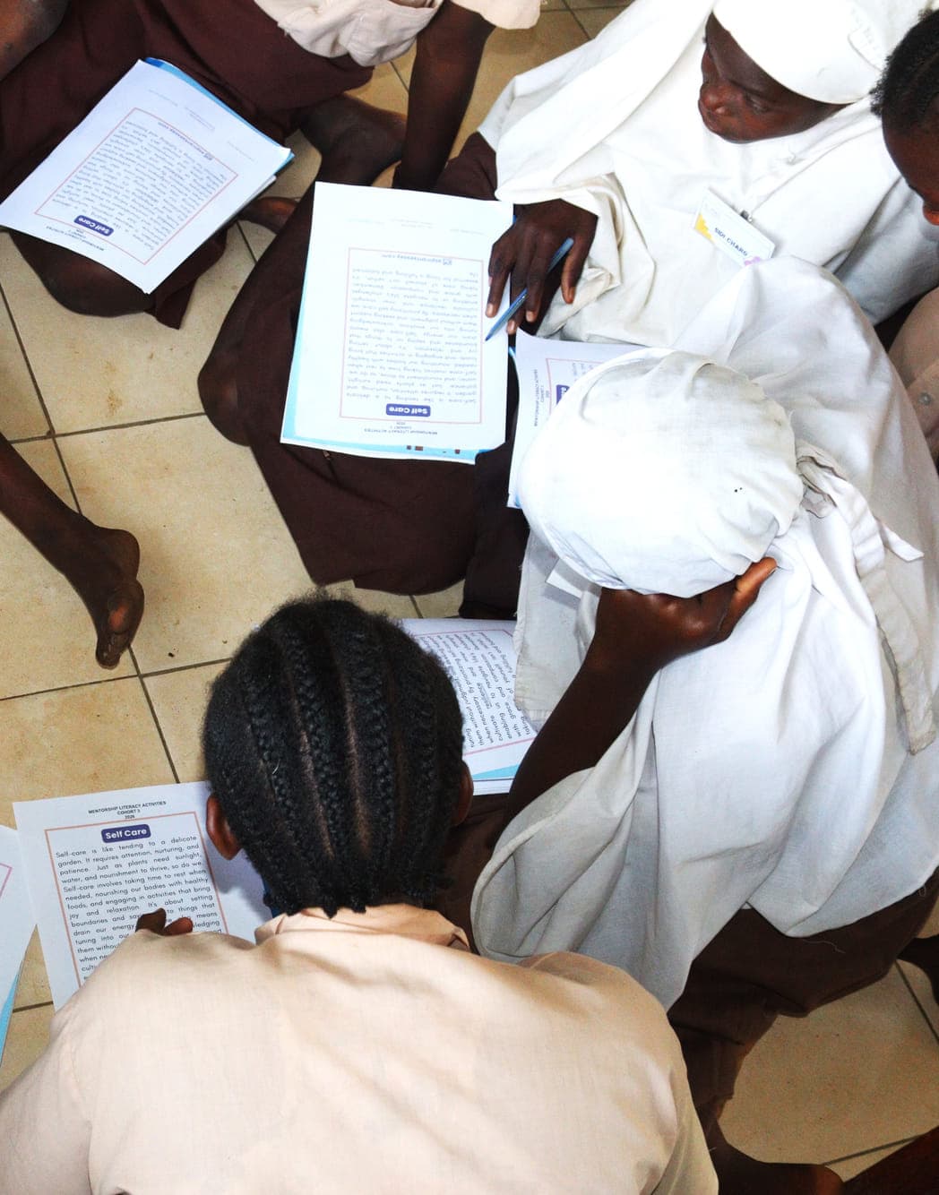 Grade 7 girls in a self-care discussion during mentorship at Ngathini