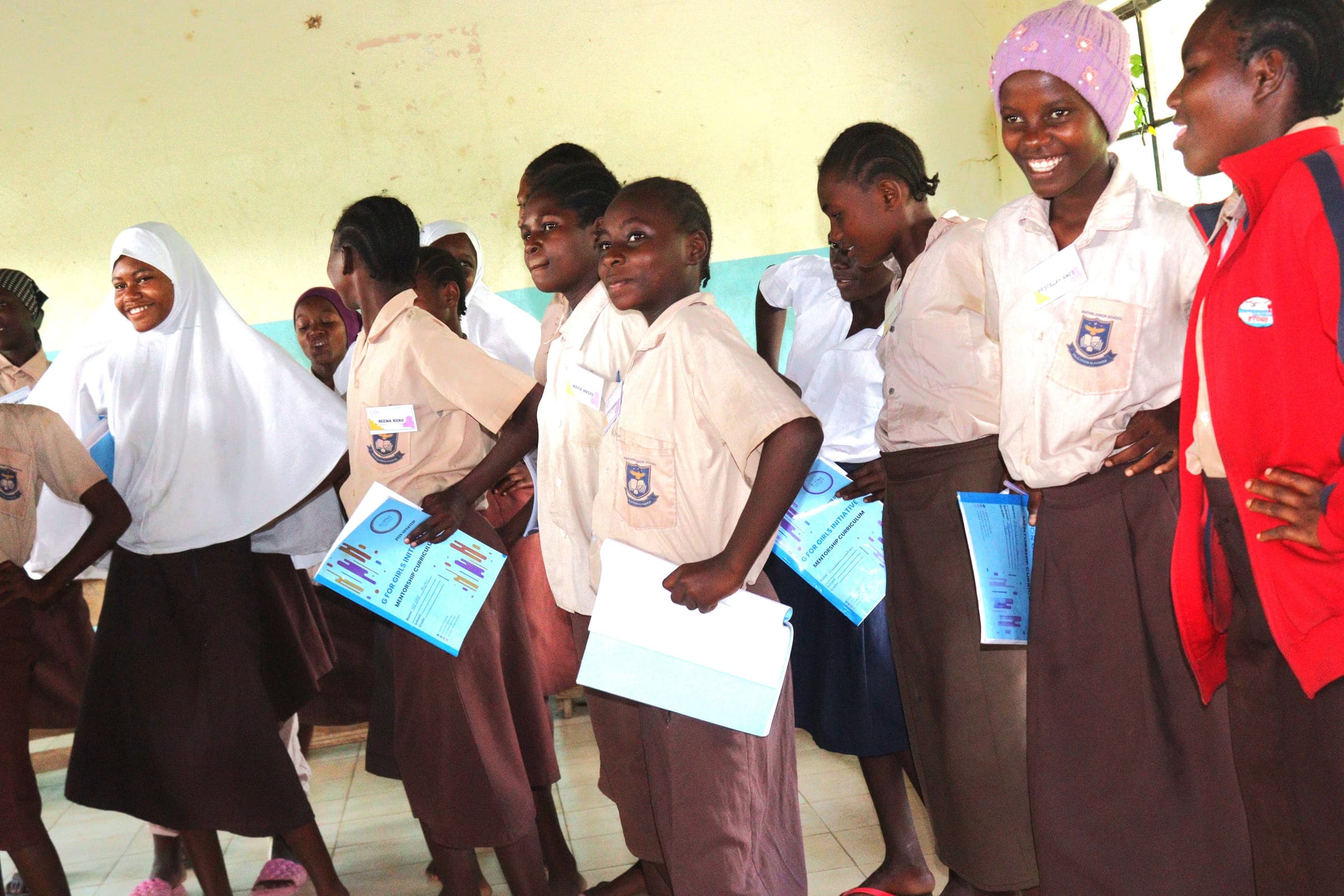 Grade 7 learners smiling during a mentorship session at Ngathini