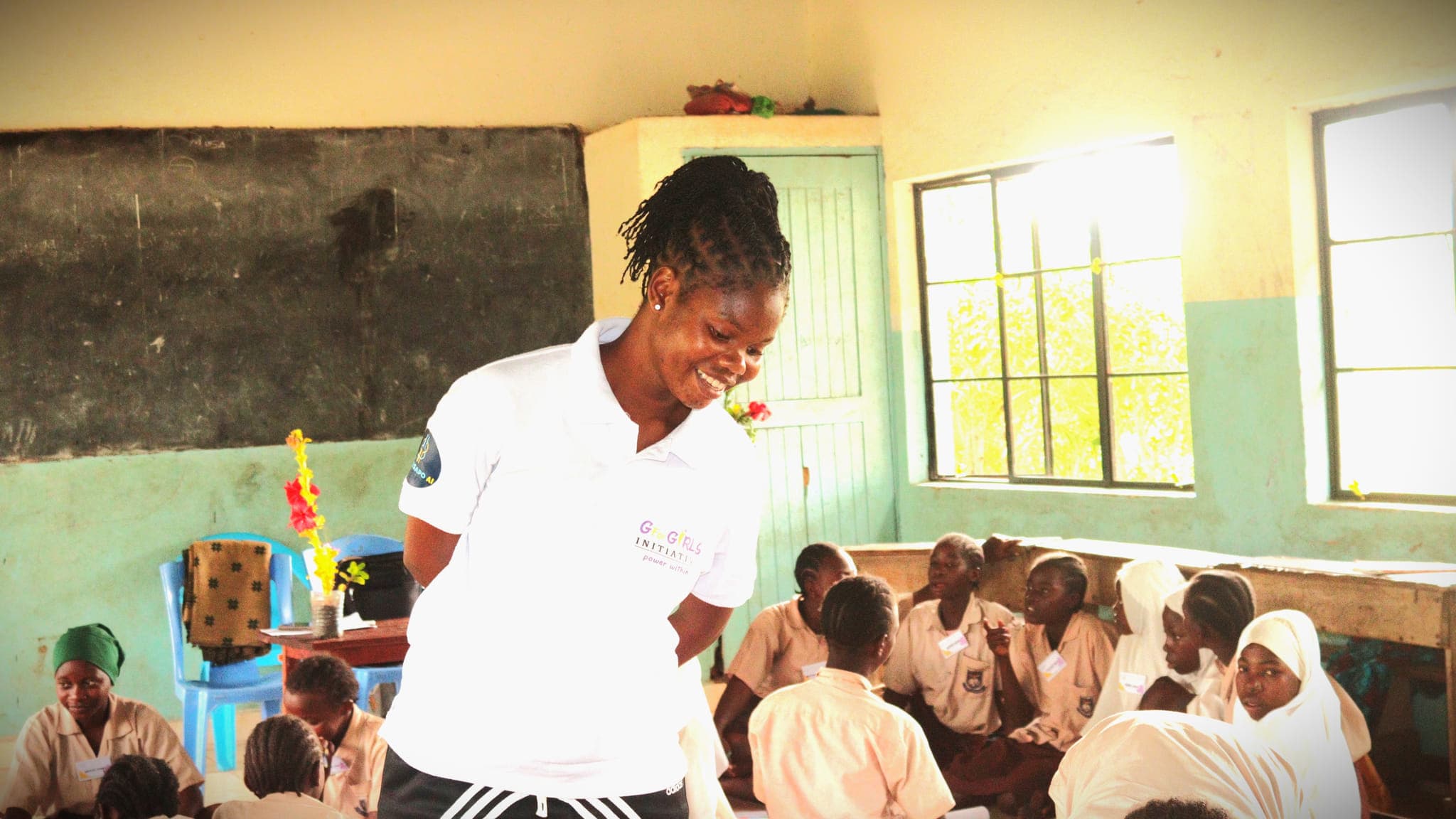 Riziki Nelson, a GGI champion, leading a mentorship session at Ngathini