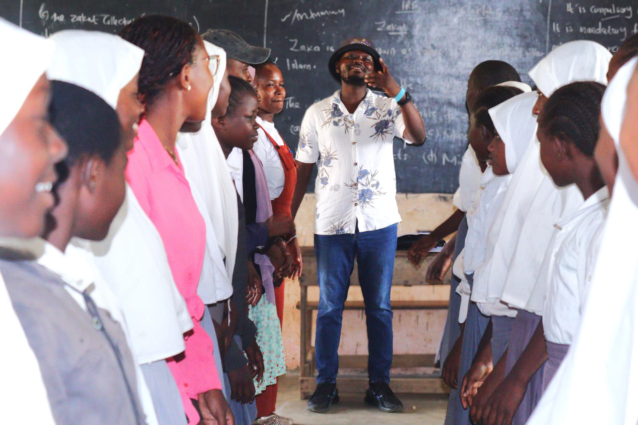 Walter Jira of Probation Services leading an ice breaker with Grade 8 and 9 learners at Tsuini